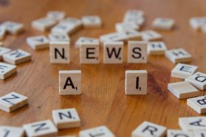 Wooden Scrabble tiles spelling 'AI' and 'NEWS' for a tech concept image. — Comment Wolfy Casino se distingue-t-il aux yeux de